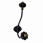 Metal knage med sorte knopper